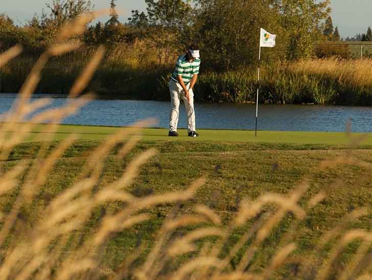 Man playing golf at Pumpkin Ridge Golf Club in Tualatin Valley