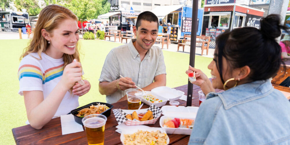 friends eating lunch at bg's food cartel