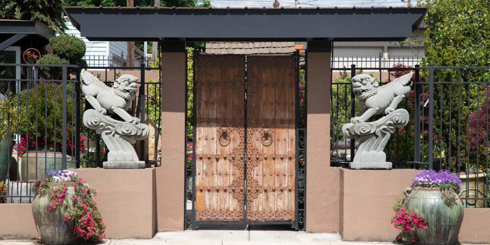 asian archway with lions on both sides