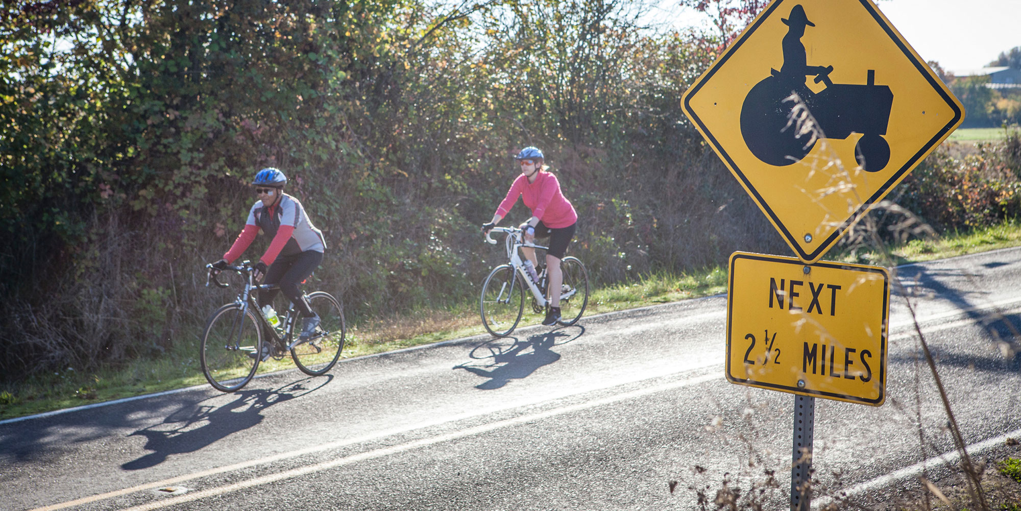 two bicyclists travel the tualatin valley scenic bikeway