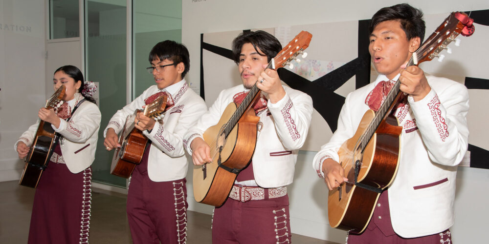 mariachi band playing guitars