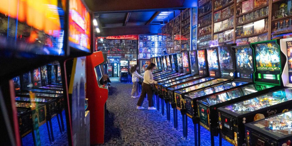 kids playing pinball