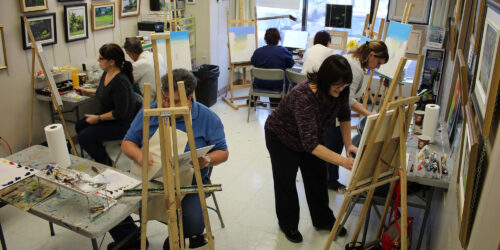 group painting in a classroom