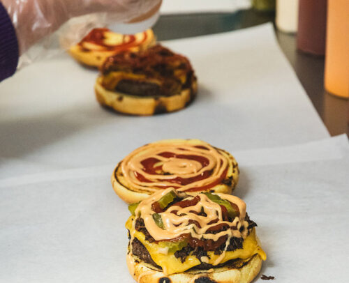 burgers being prepped